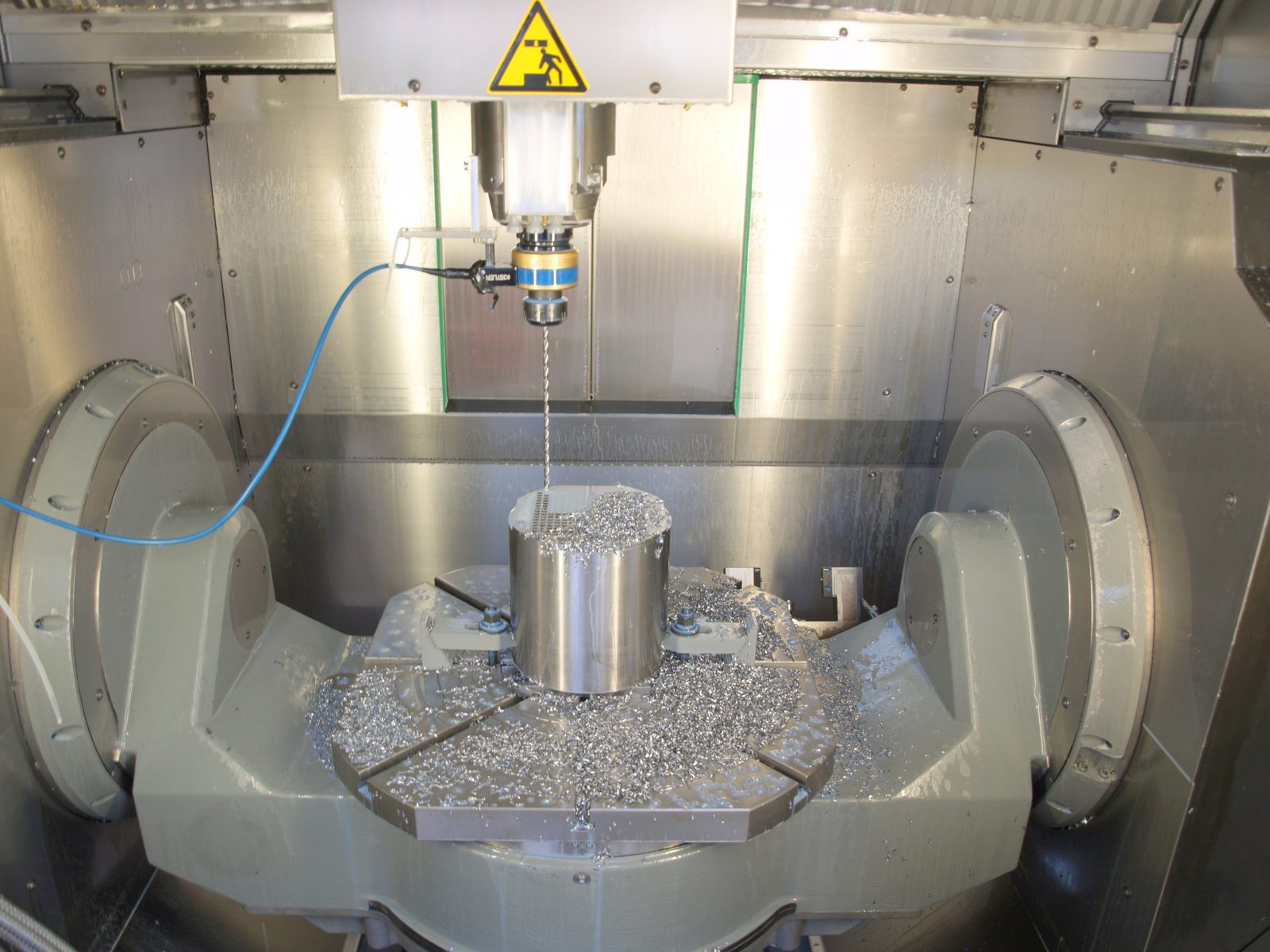 Workpiece being deep-drilled in a CNC machining centre